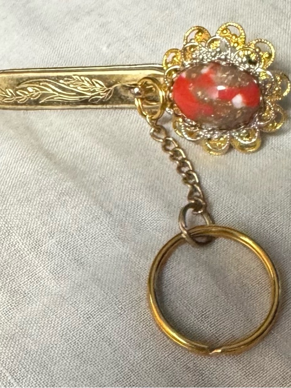 Vintage KEY FINDER with orange speckled stone